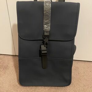Rains Navy Mini Backpack with Front Buckle